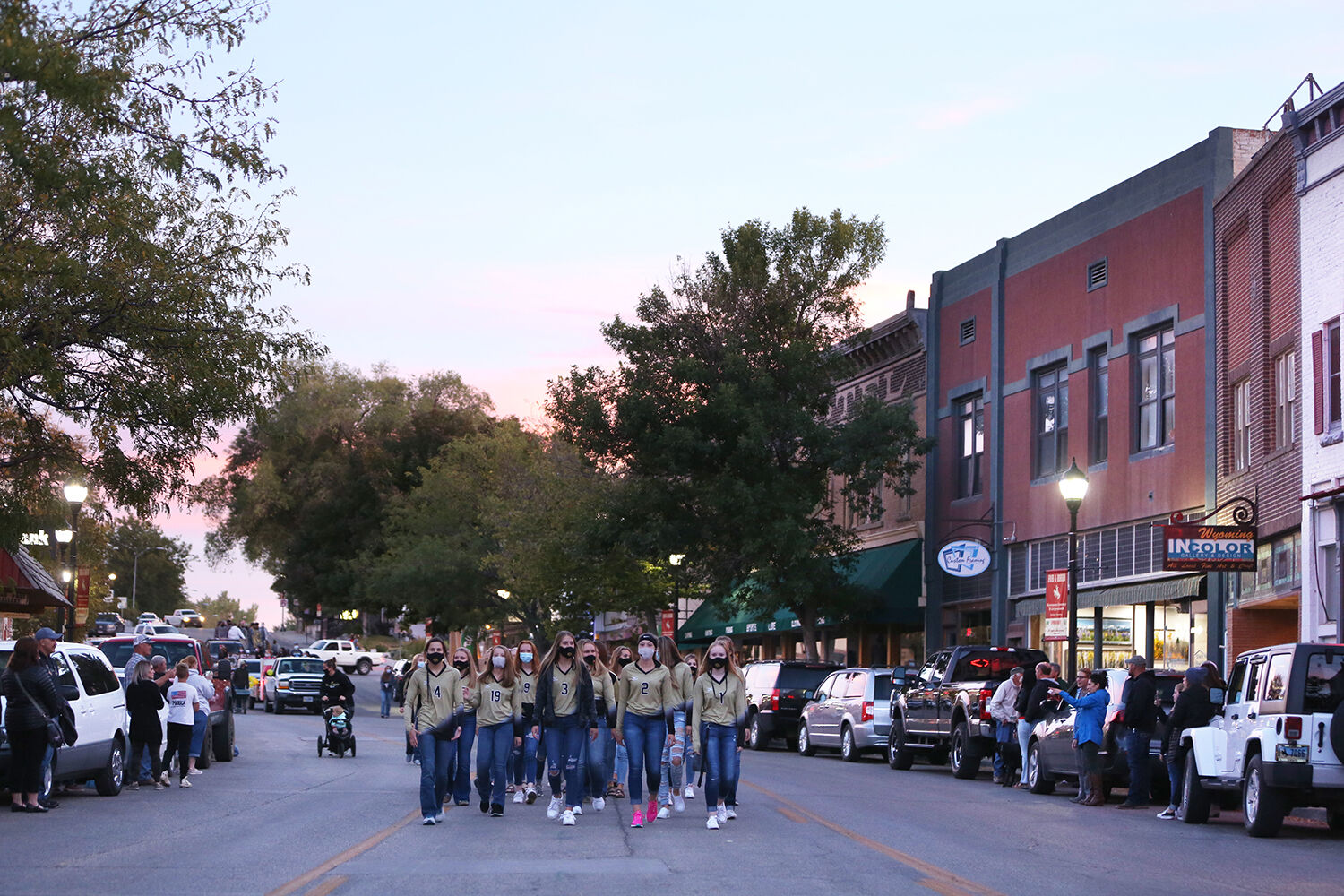 Buffalo’s high school volleyball team walks down the center of downtown
